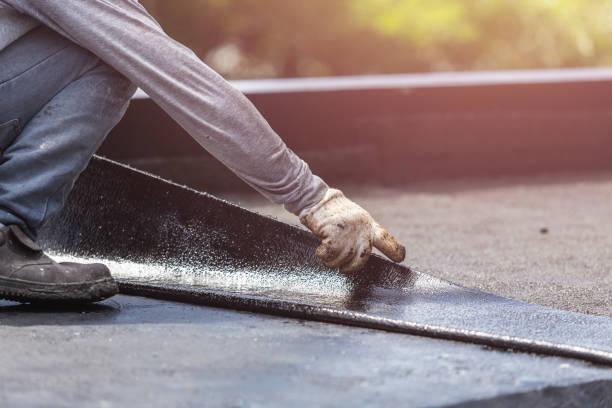 Professional Basement Waterproofing technician working in Brownsville, TN